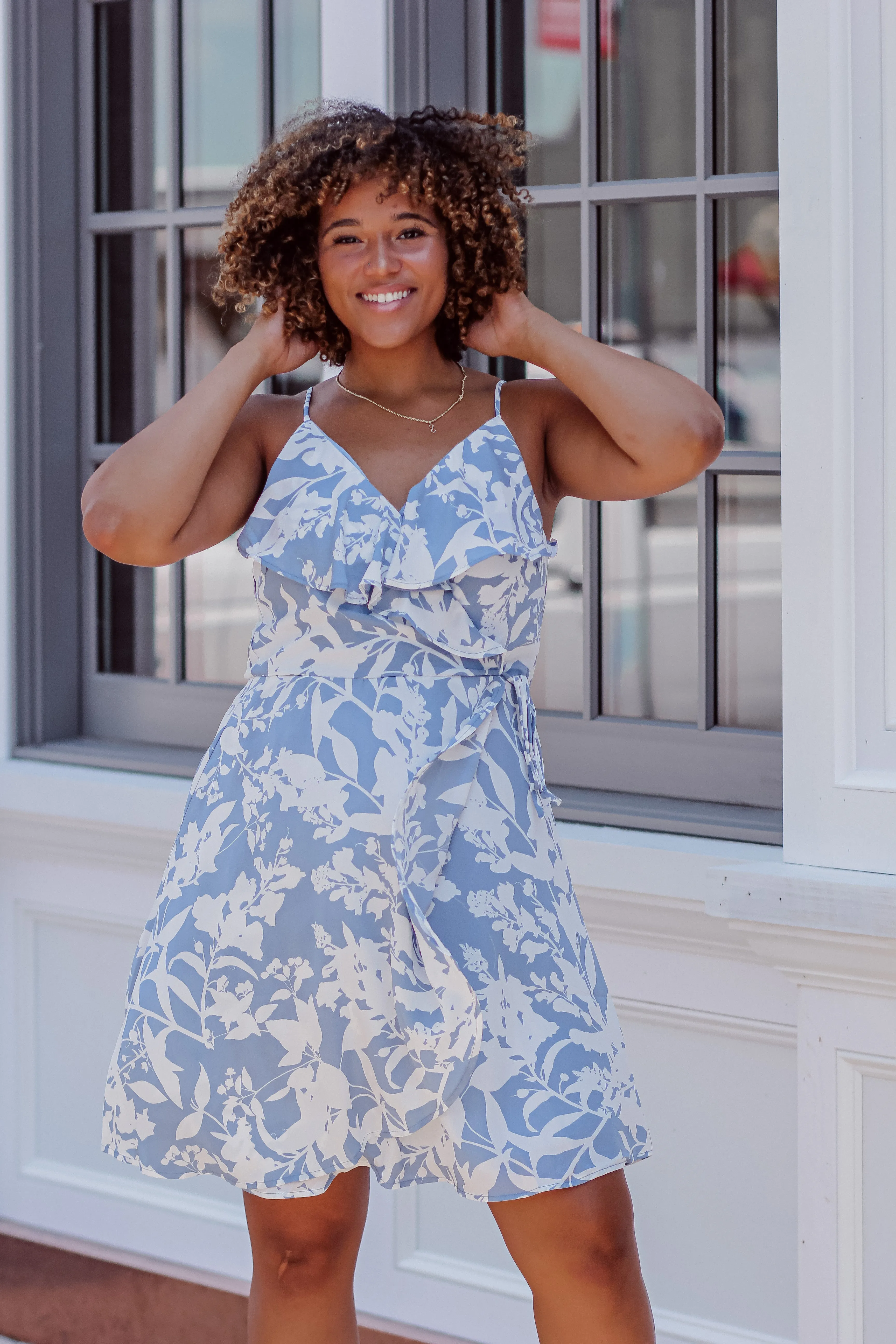 Blue & Ivory Floral Sleeveless Surplice Mini Dress